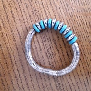 Silver and turquoise stretchy bracelet.